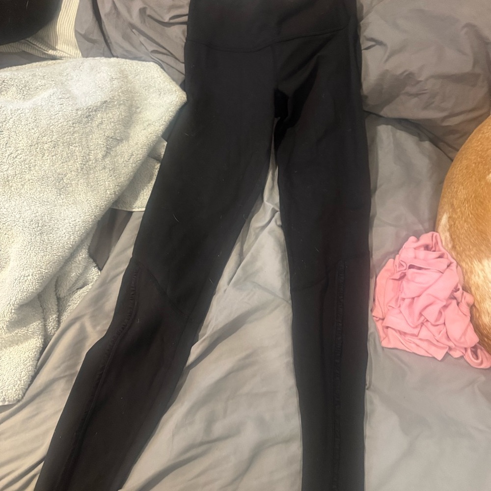 Black lululemon size 4 full length slight ruffle detail no signs of wear